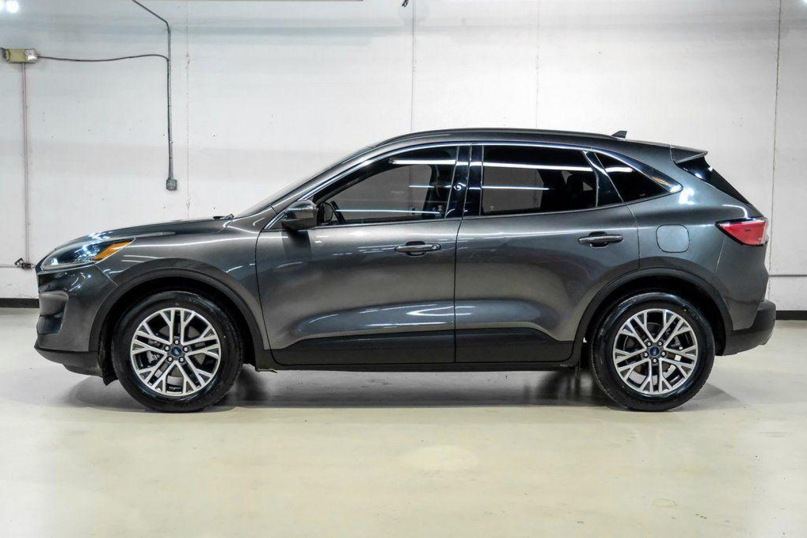 2020 Magnetic /Ebony Ford Escape SEL (1FMCU0H62LU) with an 1.5L EcoBoost engine, Automatic transmission, located at 15300 Midway Rd., Addison, TX, 75001, (972) 702-0011, 32.958321, -96.838074 - Photo#10