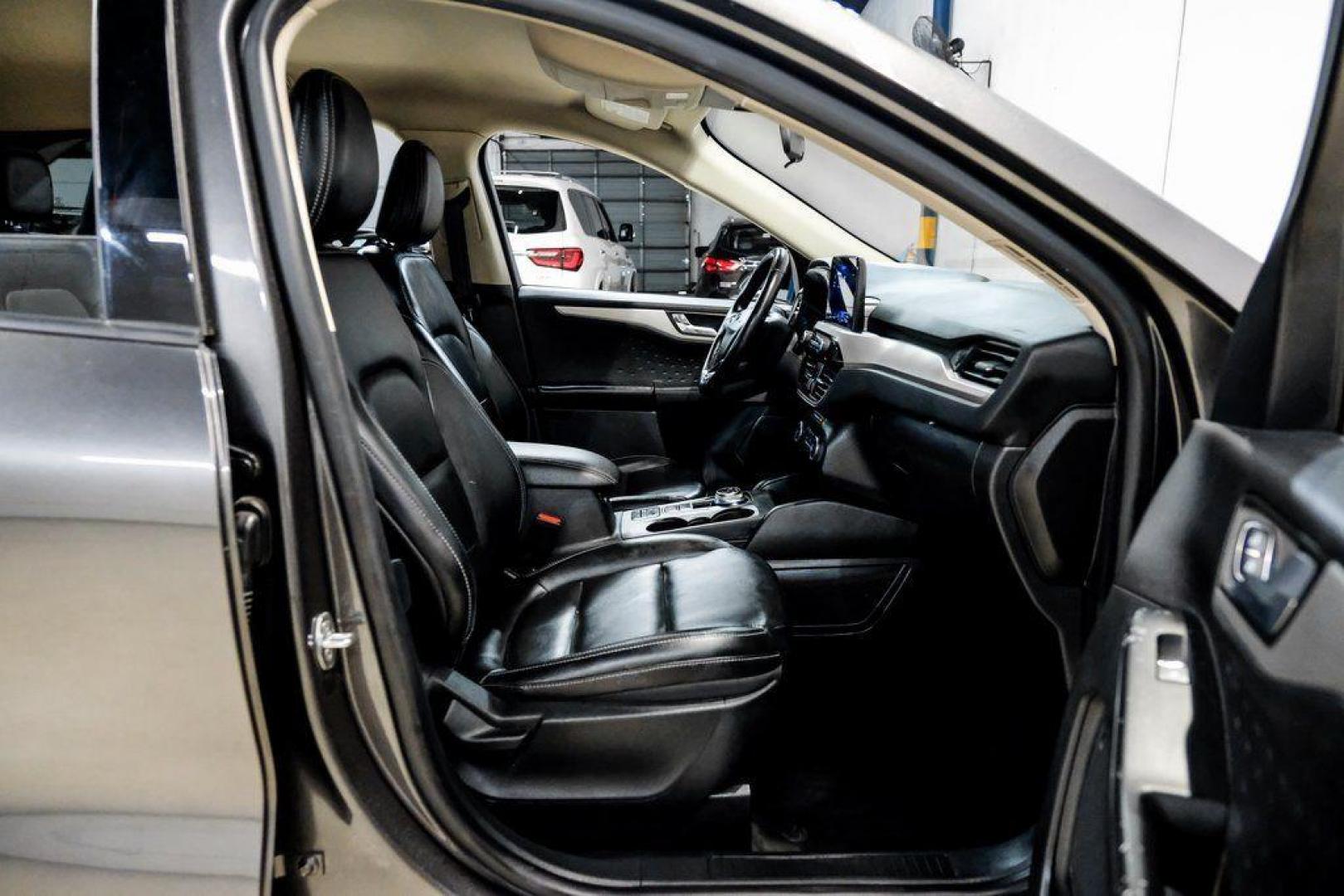 2020 Magnetic /Ebony Ford Escape SEL (1FMCU0H62LU) with an 1.5L EcoBoost engine, Automatic transmission, located at 15300 Midway Rd., Addison, TX, 75001, (972) 702-0011, 32.958321, -96.838074 - Photo#32