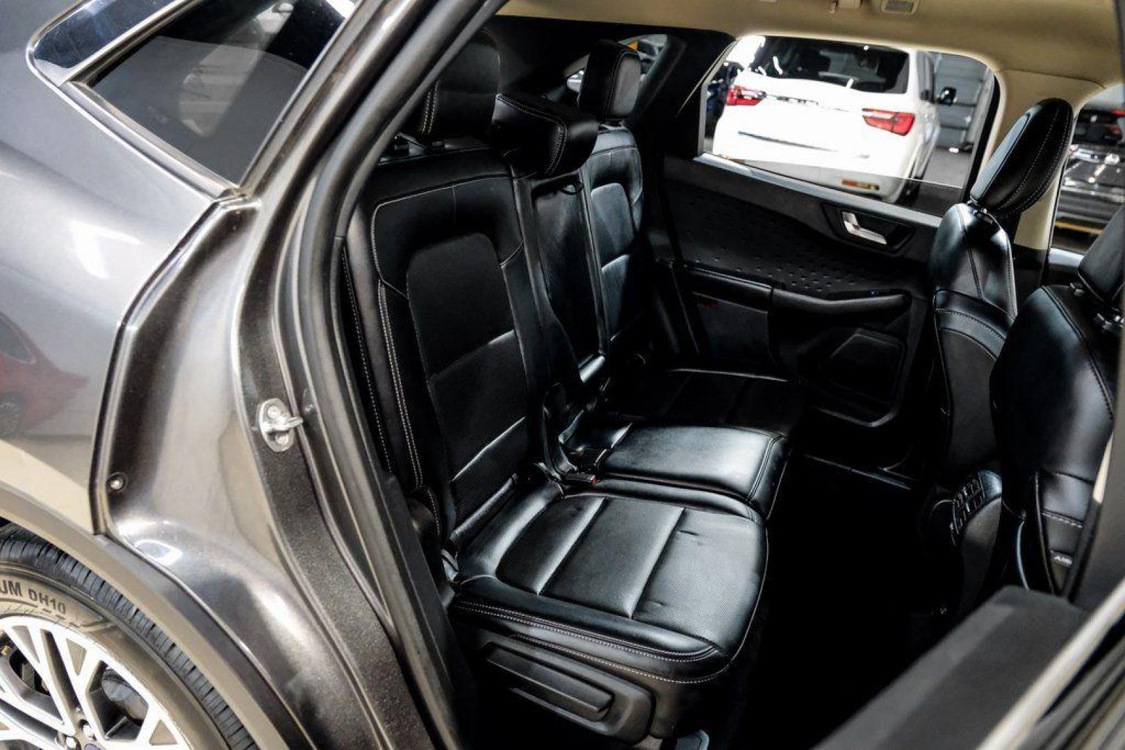 2020 Magnetic /Ebony Ford Escape SEL (1FMCU0H62LU) with an 1.5L EcoBoost engine, Automatic transmission, located at 15300 Midway Rd., Addison, TX, 75001, (972) 702-0011, 32.958321, -96.838074 - Photo#34