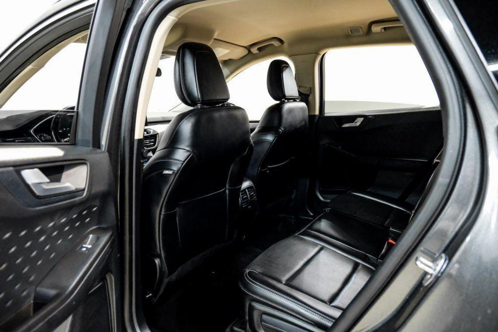 2020 Magnetic /Ebony Ford Escape SEL (1FMCU0H62LU) with an 1.5L EcoBoost engine, Automatic transmission, located at 15300 Midway Rd., Addison, TX, 75001, (972) 702-0011, 32.958321, -96.838074 - Photo#36