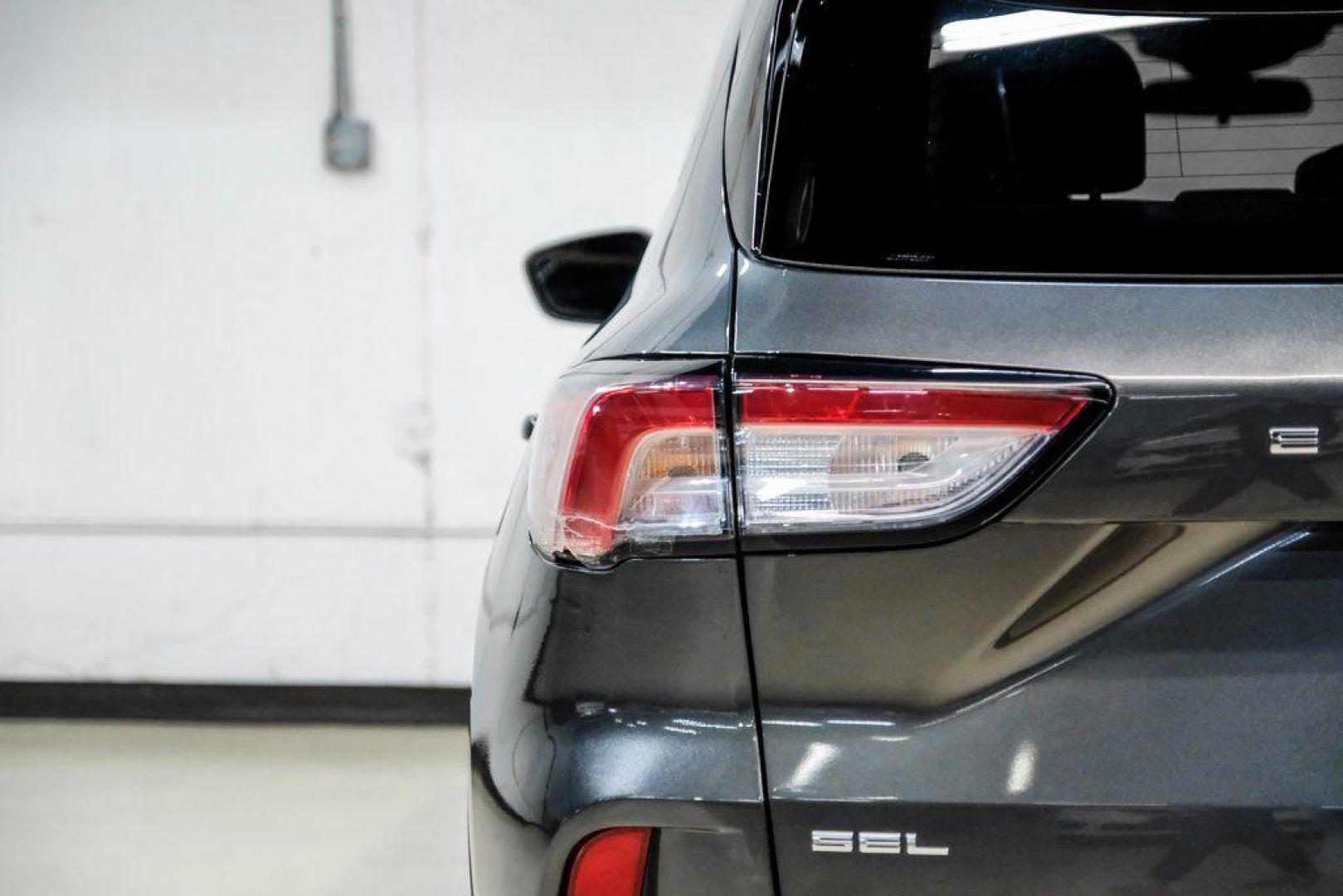 2020 Magnetic /Ebony Ford Escape SEL (1FMCU0H62LU) with an 1.5L EcoBoost engine, Automatic transmission, located at 15300 Midway Rd., Addison, TX, 75001, (972) 702-0011, 32.958321, -96.838074 - Photo#45