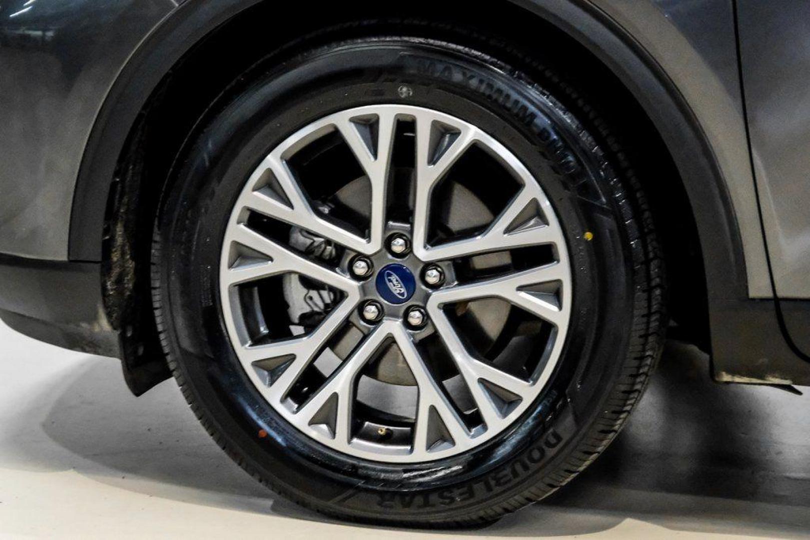 2020 Magnetic /Ebony Ford Escape SEL (1FMCU0H62LU) with an 1.5L EcoBoost engine, Automatic transmission, located at 15300 Midway Rd., Addison, TX, 75001, (972) 702-0011, 32.958321, -96.838074 - Photo#51