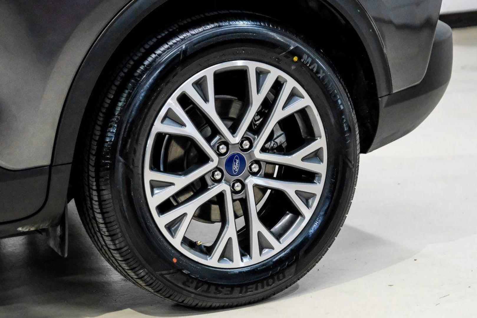 2020 Magnetic /Ebony Ford Escape SEL (1FMCU0H62LU) with an 1.5L EcoBoost engine, Automatic transmission, located at 15300 Midway Rd., Addison, TX, 75001, (972) 702-0011, 32.958321, -96.838074 - Photo#52