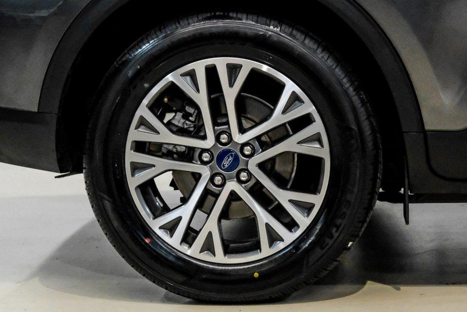 2020 Magnetic /Ebony Ford Escape SEL (1FMCU0H62LU) with an 1.5L EcoBoost engine, Automatic transmission, located at 15300 Midway Rd., Addison, TX, 75001, (972) 702-0011, 32.958321, -96.838074 - Photo#53