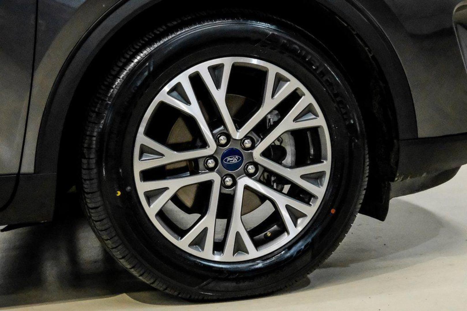 2020 Magnetic /Ebony Ford Escape SEL (1FMCU0H62LU) with an 1.5L EcoBoost engine, Automatic transmission, located at 15300 Midway Rd., Addison, TX, 75001, (972) 702-0011, 32.958321, -96.838074 - Photo#54