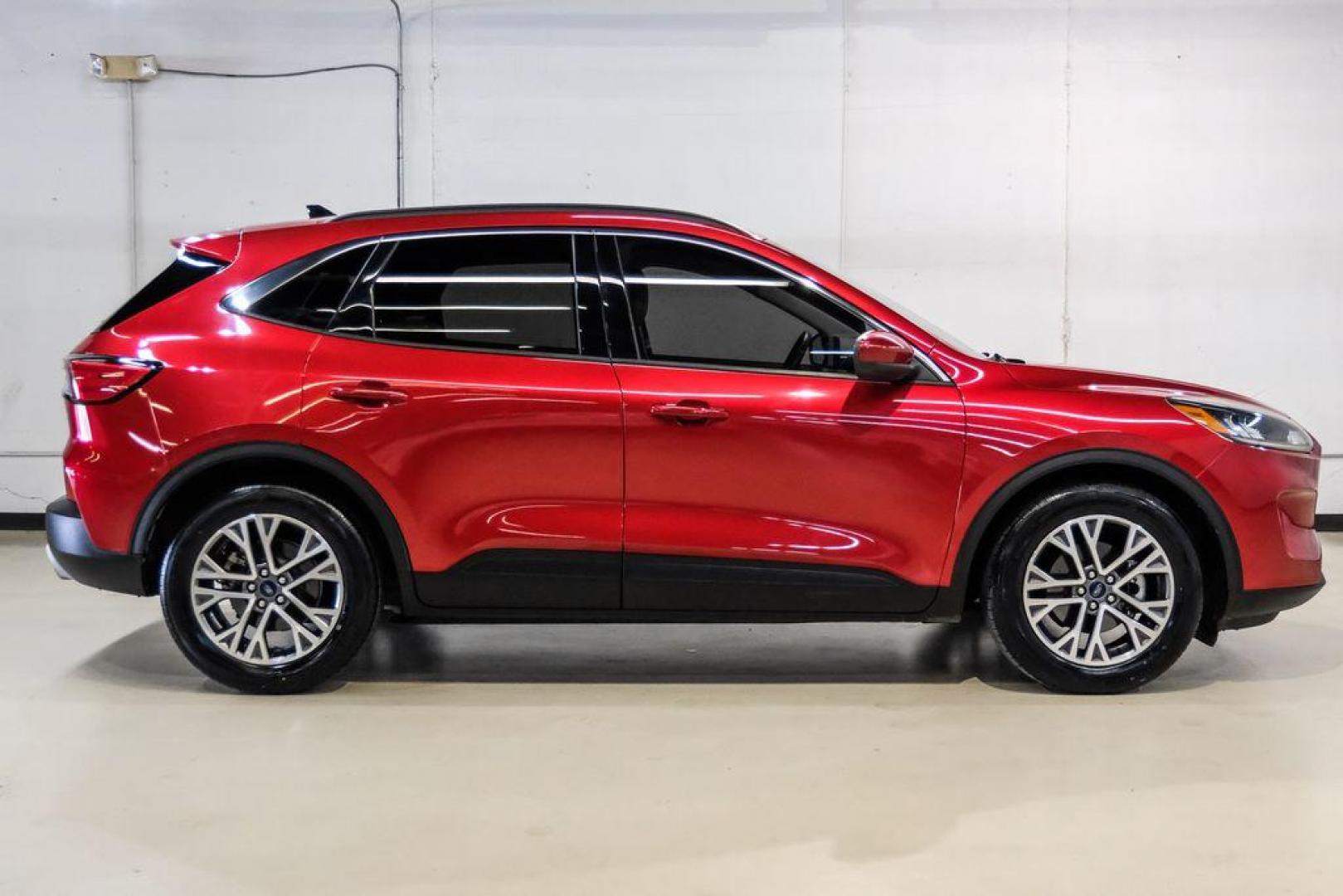 2020 Red Metallic /Sandstone Ford Escape SEL (1FMCU0H66LU) with an 1.5L EcoBoost engine, Automatic transmission, located at 15300 Midway Rd., Addison, TX, 75001, (972) 702-0011, 32.958321, -96.838074 - Photo#6