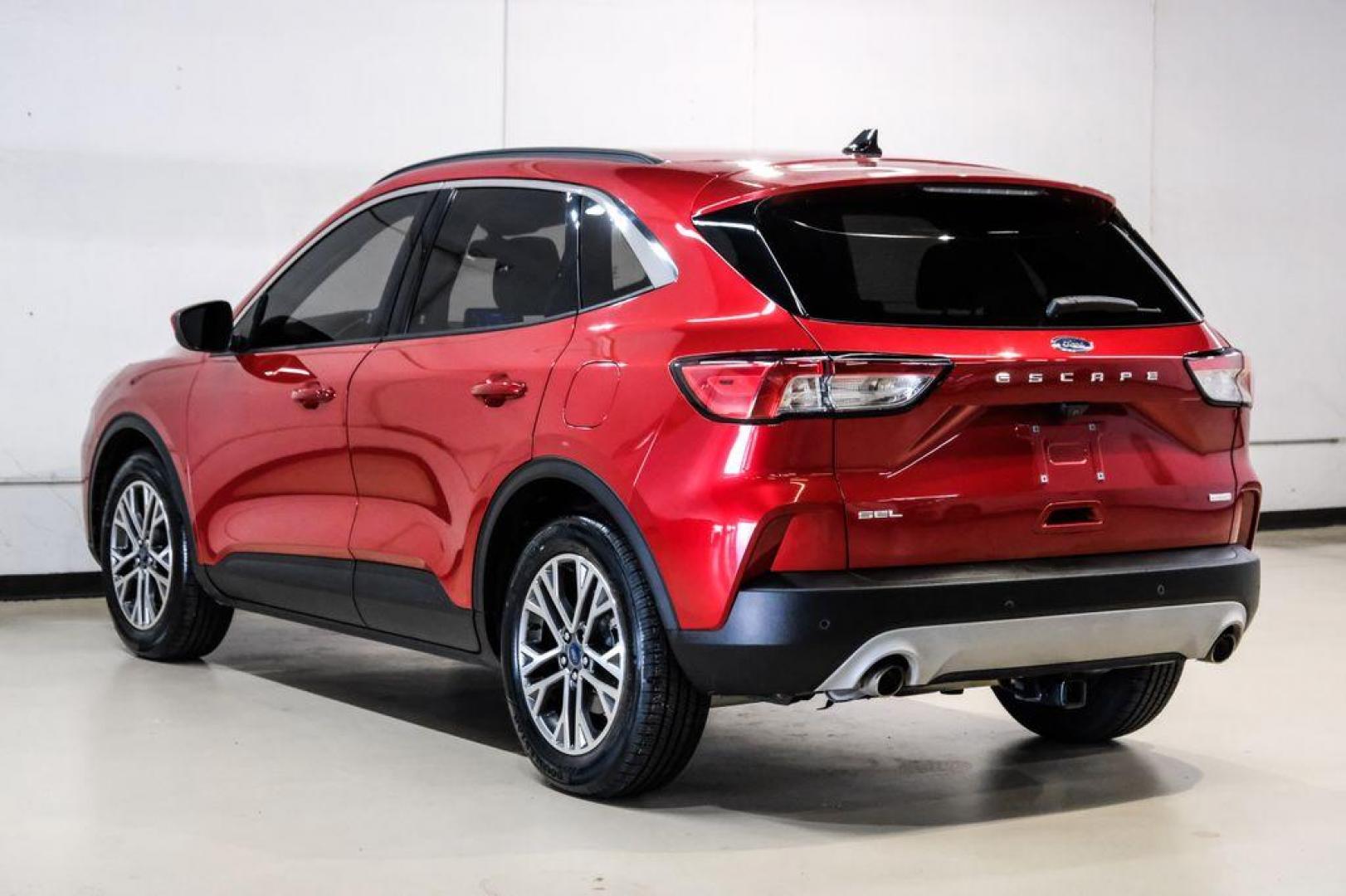 2020 Red Metallic /Sandstone Ford Escape SEL (1FMCU0H66LU) with an 1.5L EcoBoost engine, Automatic transmission, located at 15300 Midway Rd., Addison, TX, 75001, (972) 702-0011, 32.958321, -96.838074 - Photo#9