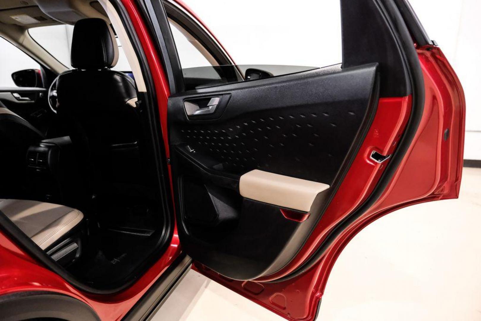 2020 Red Metallic /Sandstone Ford Escape SEL (1FMCU0H66LU) with an 1.5L EcoBoost engine, Automatic transmission, located at 15300 Midway Rd., Addison, TX, 75001, (972) 702-0011, 32.958321, -96.838074 - Photo#43