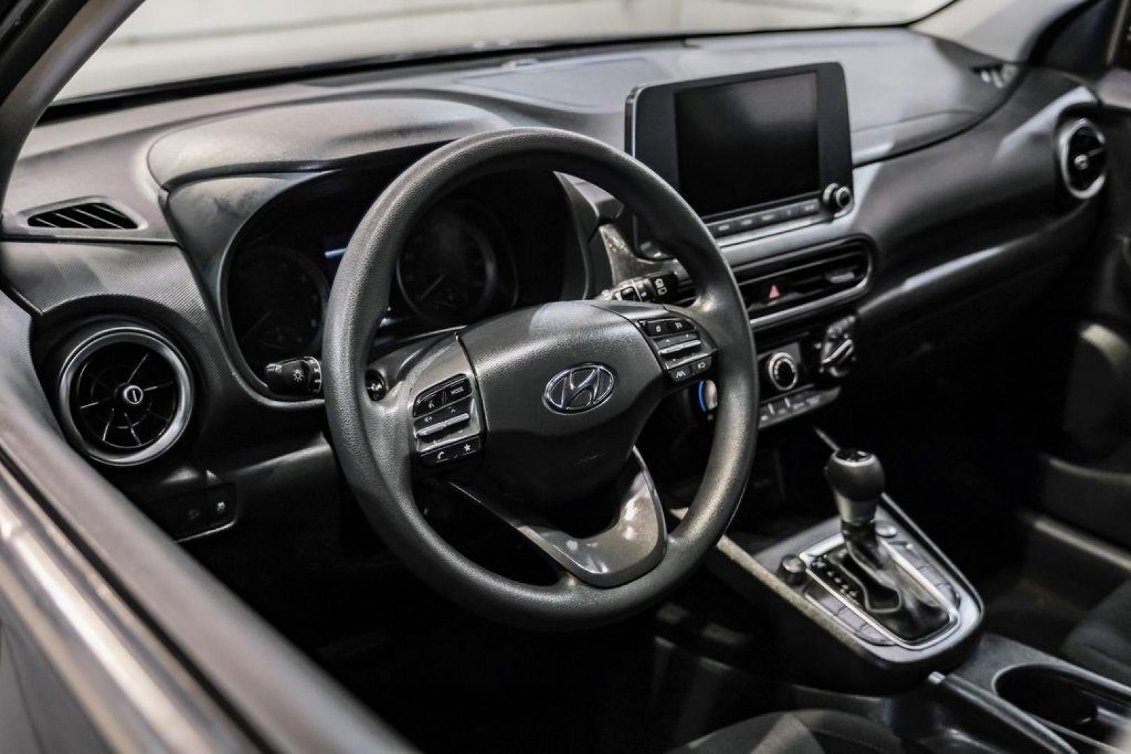 2022 Ultra Black /Black Hyundai Kona SEL (KM8K62AB1NU) with an 2.0L I4 MPI DOHC 16V LEV3-ULEV70 147hp engine, CVT transmission, located at 15300 Midway Rd., Addison, TX, 75001, (972) 702-0011, 32.958321, -96.838074 - Photo#16