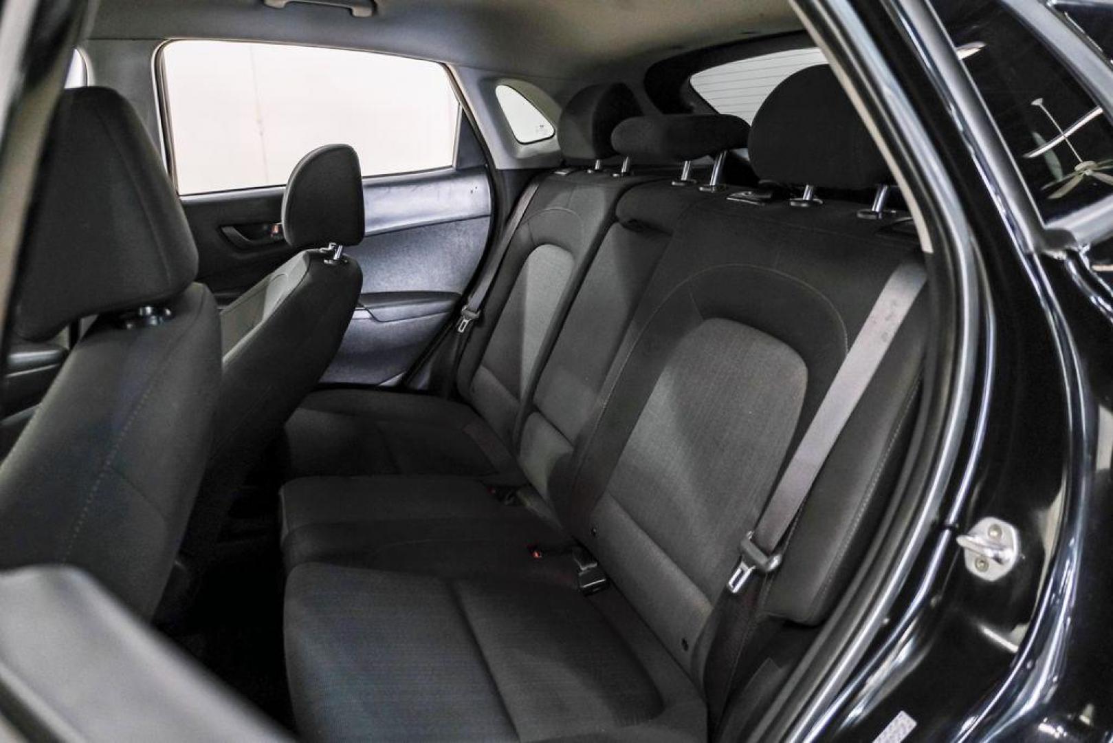 2022 Ultra Black /Black Hyundai Kona SEL (KM8K62AB1NU) with an 2.0L I4 MPI DOHC 16V LEV3-ULEV70 147hp engine, CVT transmission, located at 15300 Midway Rd., Addison, TX, 75001, (972) 702-0011, 32.958321, -96.838074 - Photo#35