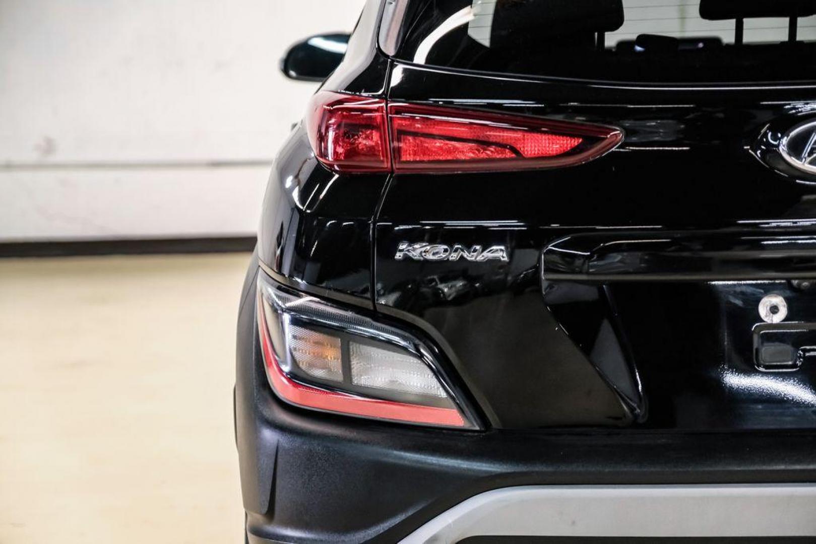 2022 Ultra Black /Black Hyundai Kona SEL (KM8K62AB1NU) with an 2.0L I4 MPI DOHC 16V LEV3-ULEV70 147hp engine, CVT transmission, located at 15300 Midway Rd., Addison, TX, 75001, (972) 702-0011, 32.958321, -96.838074 - Photo#45