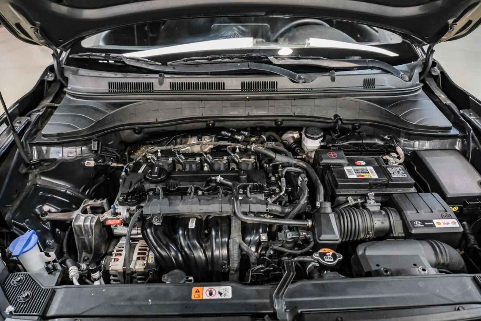 2022 Ultra Black /Black Hyundai Kona SEL (KM8K62AB1NU) with an 2.0L I4 MPI DOHC 16V LEV3-ULEV70 147hp engine, CVT transmission, located at 15300 Midway Rd., Addison, TX, 75001, (972) 702-0011, 32.958321, -96.838074 - Photo#47