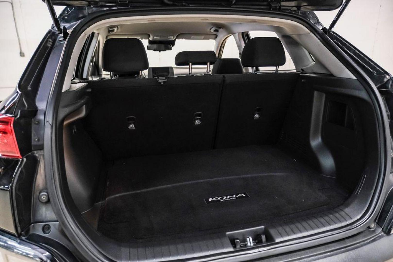 2022 Ultra Black /Black Hyundai Kona SEL (KM8K62AB1NU) with an 2.0L I4 MPI DOHC 16V LEV3-ULEV70 147hp engine, CVT transmission, located at 15300 Midway Rd., Addison, TX, 75001, (972) 702-0011, 32.958321, -96.838074 - Photo#50