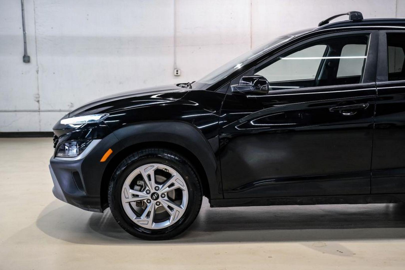 2022 Ultra Black /Black Hyundai Kona SEL (KM8K62AB1NU) with an 2.0L I4 MPI DOHC 16V LEV3-ULEV70 147hp engine, CVT transmission, located at 15300 Midway Rd., Addison, TX, 75001, (972) 702-0011, 32.958321, -96.838074 - Photo#11