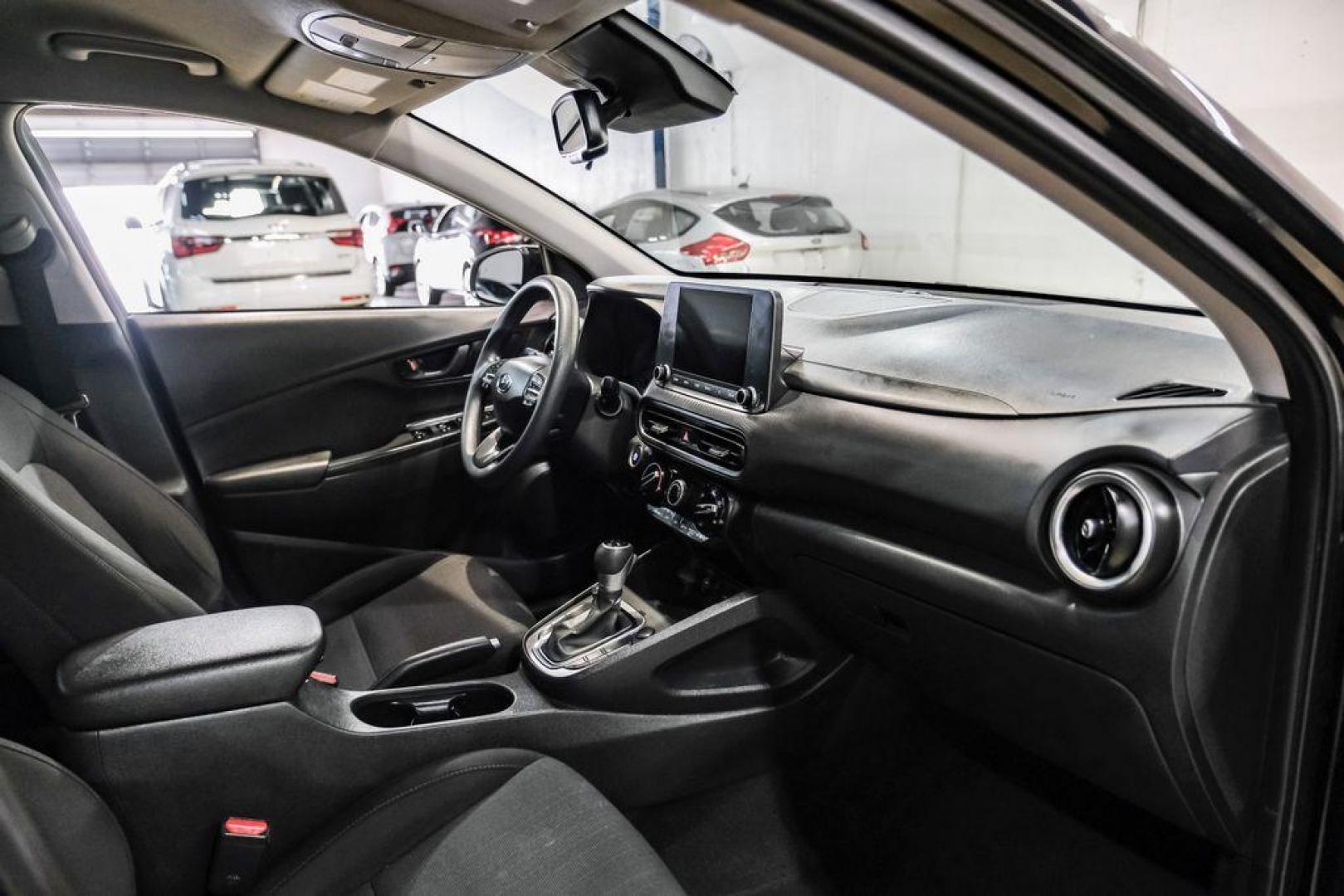 2022 Ultra Black /Black Hyundai Kona SEL (KM8K62AB1NU) with an 2.0L I4 MPI DOHC 16V LEV3-ULEV70 147hp engine, CVT transmission, located at 15300 Midway Rd., Addison, TX, 75001, (972) 702-0011, 32.958321, -96.838074 - Photo#13