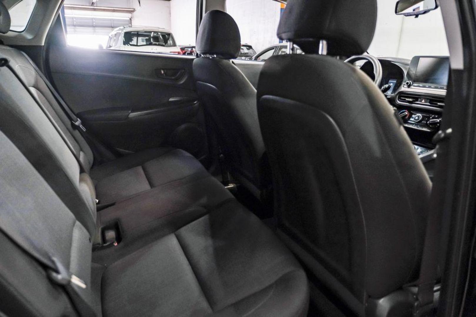 2022 Ultra Black /Black Hyundai Kona SEL (KM8K62AB1NU) with an 2.0L I4 MPI DOHC 16V LEV3-ULEV70 147hp engine, CVT transmission, located at 15300 Midway Rd., Addison, TX, 75001, (972) 702-0011, 32.958321, -96.838074 - Photo#33