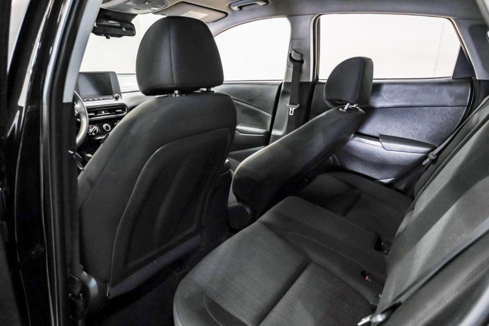 2022 Ultra Black /Black Hyundai Kona SEL (KM8K62AB1NU) with an 2.0L I4 MPI DOHC 16V LEV3-ULEV70 147hp engine, CVT transmission, located at 15300 Midway Rd., Addison, TX, 75001, (972) 702-0011, 32.958321, -96.838074 - Photo#34