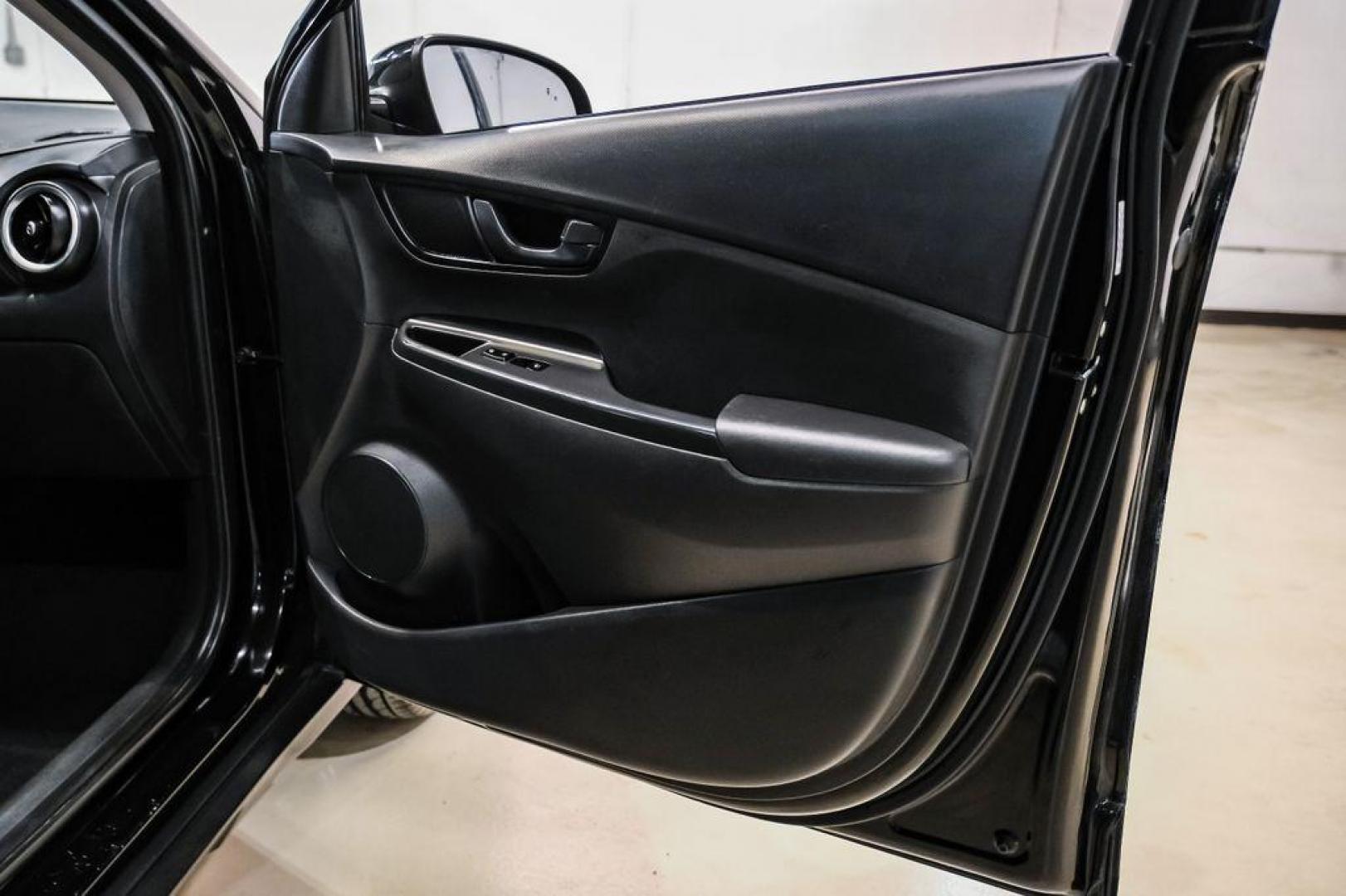 2022 Ultra Black /Black Hyundai Kona SEL (KM8K62AB1NU) with an 2.0L I4 MPI DOHC 16V LEV3-ULEV70 147hp engine, CVT transmission, located at 15300 Midway Rd., Addison, TX, 75001, (972) 702-0011, 32.958321, -96.838074 - Photo#40