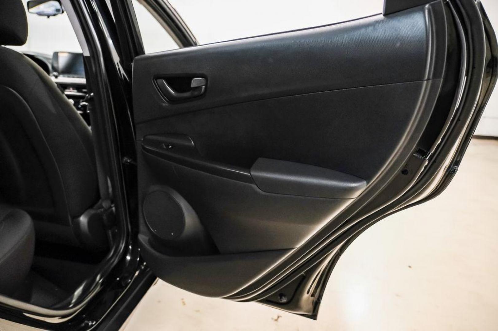 2022 Ultra Black /Black Hyundai Kona SEL (KM8K62AB1NU) with an 2.0L I4 MPI DOHC 16V LEV3-ULEV70 147hp engine, CVT transmission, located at 15300 Midway Rd., Addison, TX, 75001, (972) 702-0011, 32.958321, -96.838074 - Photo#42