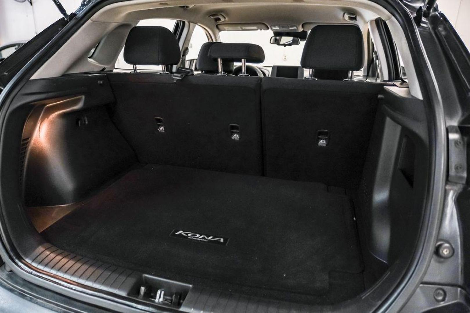 2022 Ultra Black /Black Hyundai Kona SEL (KM8K62AB1NU) with an 2.0L I4 MPI DOHC 16V LEV3-ULEV70 147hp engine, CVT transmission, located at 15300 Midway Rd., Addison, TX, 75001, (972) 702-0011, 32.958321, -96.838074 - Photo#49