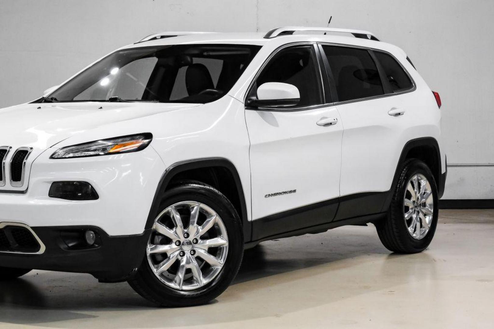 2015 Bright White Clearcoat /Indigo Blue/Brown Jeep Cherokee Limited (1C4PJMDS3FW) with an 3.2L V6 engine, Automatic transmission, located at 15300 Midway Rd., Addison, TX, 75001, (972) 702-0011, 32.958321, -96.838074 - Photo#5