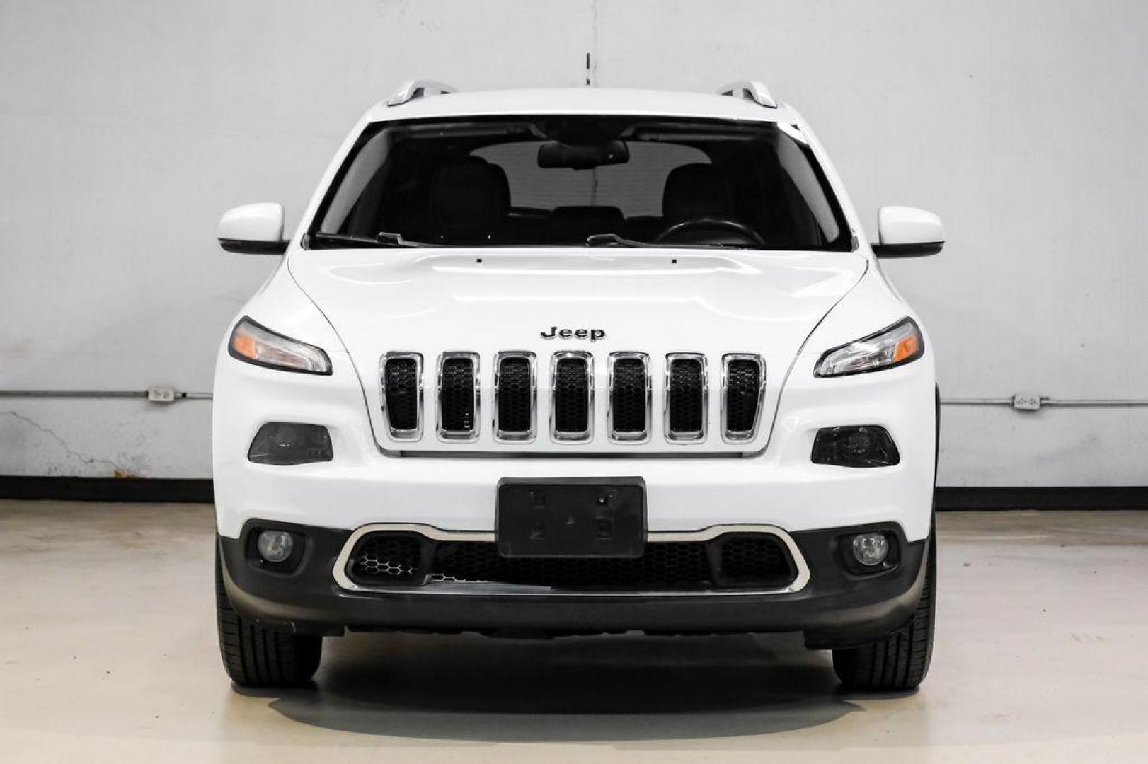 2015 Bright White Clearcoat /Indigo Blue/Brown Jeep Cherokee Limited (1C4PJMDS3FW) with an 3.2L V6 engine, Automatic transmission, located at 15300 Midway Rd., Addison, TX, 75001, (972) 702-0011, 32.958321, -96.838074 - Photo#6