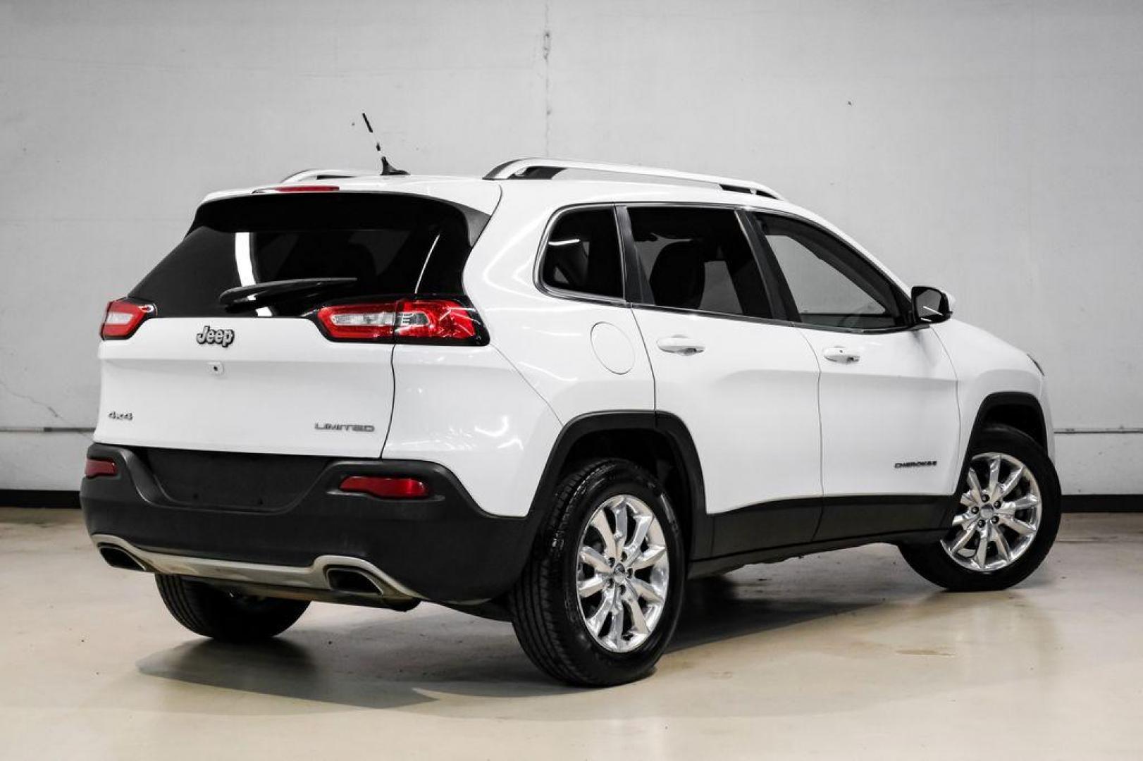 2015 Bright White Clearcoat /Indigo Blue/Brown Jeep Cherokee Limited (1C4PJMDS3FW) with an 3.2L V6 engine, Automatic transmission, located at 15300 Midway Rd., Addison, TX, 75001, (972) 702-0011, 32.958321, -96.838074 - Photo#9