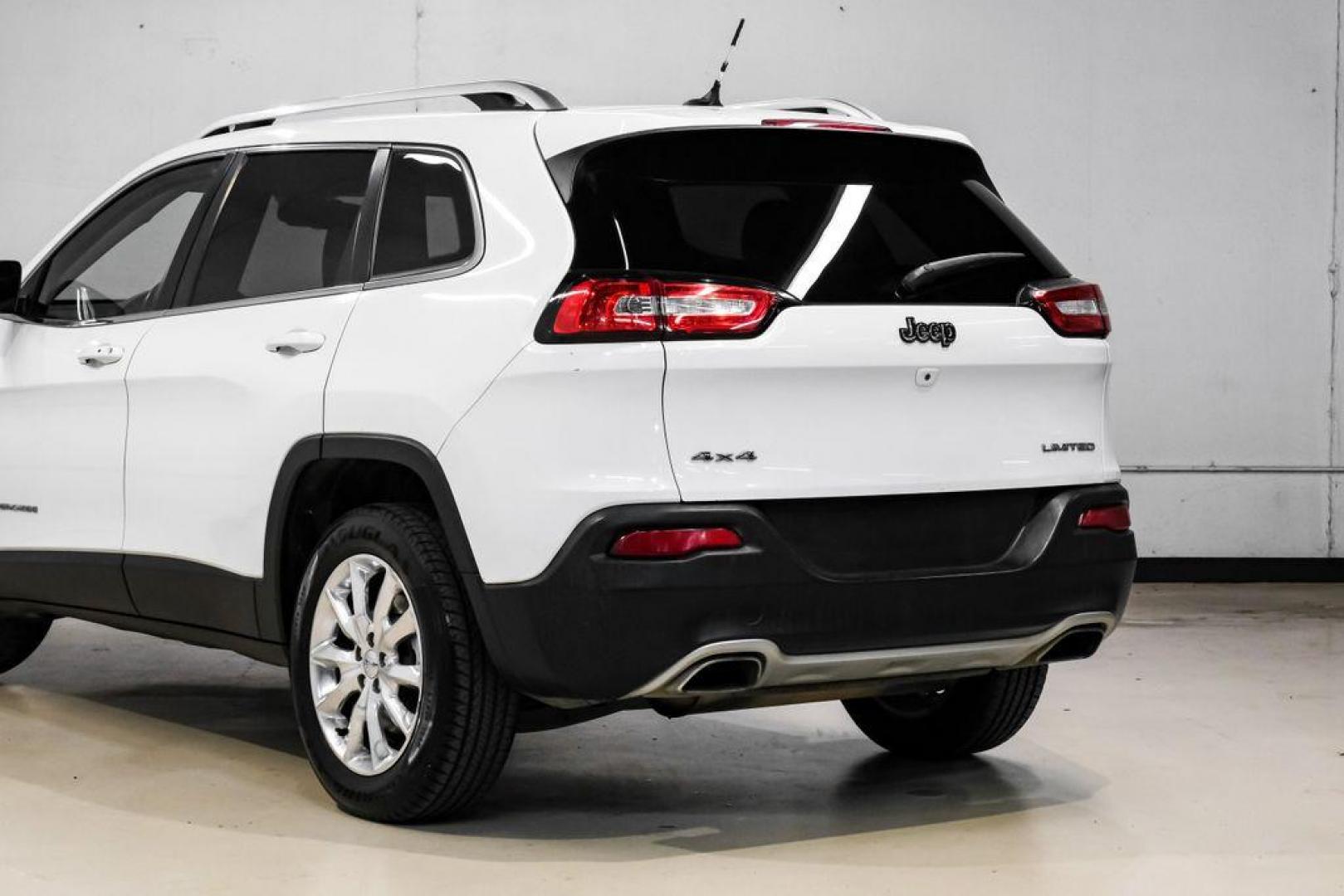 2015 Bright White Clearcoat /Indigo Blue/Brown Jeep Cherokee Limited (1C4PJMDS3FW) with an 3.2L V6 engine, Automatic transmission, located at 15300 Midway Rd., Addison, TX, 75001, (972) 702-0011, 32.958321, -96.838074 - Photo#13