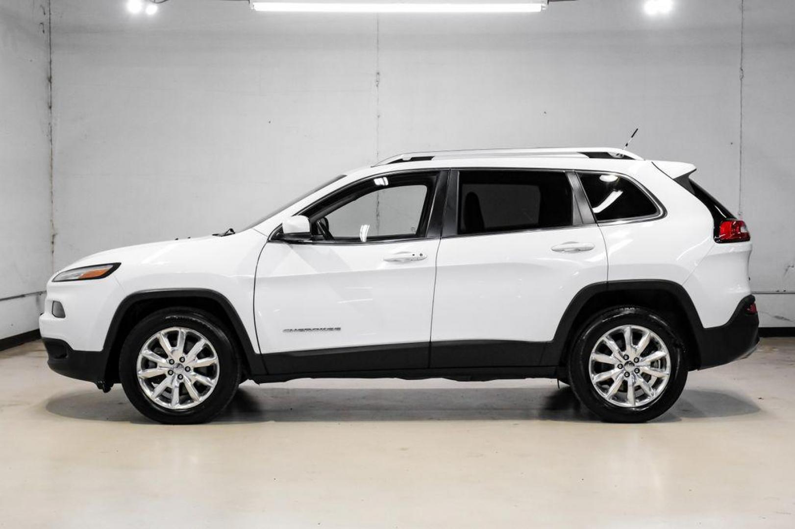 2015 Bright White Clearcoat /Indigo Blue/Brown Jeep Cherokee Limited (1C4PJMDS3FW) with an 3.2L V6 engine, Automatic transmission, located at 15300 Midway Rd., Addison, TX, 75001, (972) 702-0011, 32.958321, -96.838074 - Photo#14