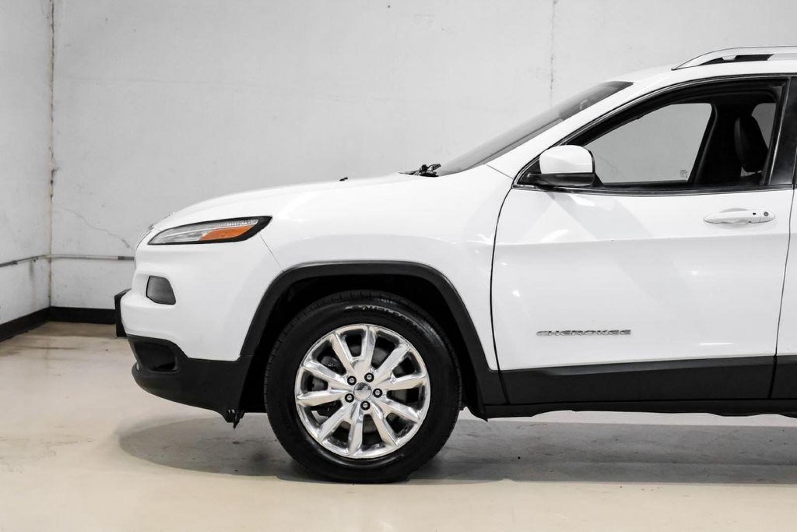 2015 Bright White Clearcoat /Indigo Blue/Brown Jeep Cherokee Limited (1C4PJMDS3FW) with an 3.2L V6 engine, Automatic transmission, located at 15300 Midway Rd., Addison, TX, 75001, (972) 702-0011, 32.958321, -96.838074 - Photo#15