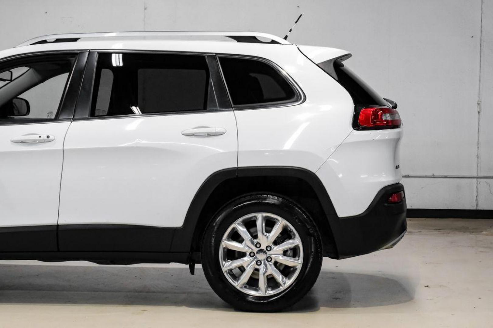 2015 Bright White Clearcoat /Indigo Blue/Brown Jeep Cherokee Limited (1C4PJMDS3FW) with an 3.2L V6 engine, Automatic transmission, located at 15300 Midway Rd., Addison, TX, 75001, (972) 702-0011, 32.958321, -96.838074 - Photo#16