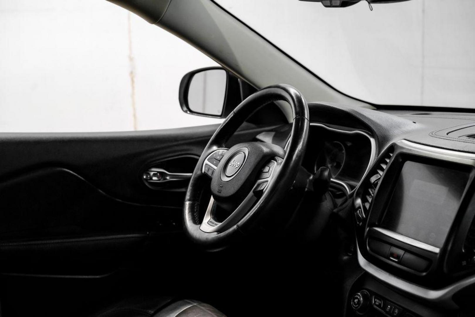 2015 Bright White Clearcoat /Indigo Blue/Brown Jeep Cherokee Limited (1C4PJMDS3FW) with an 3.2L V6 engine, Automatic transmission, located at 15300 Midway Rd., Addison, TX, 75001, (972) 702-0011, 32.958321, -96.838074 - Photo#19