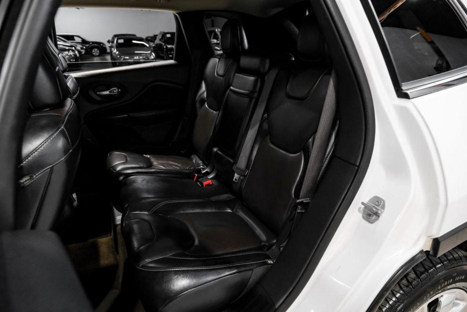 2015 Bright White Clearcoat /Indigo Blue/Brown Jeep Cherokee Limited (1C4PJMDS3FW) with an 3.2L V6 engine, Automatic transmission, located at 15300 Midway Rd., Addison, TX, 75001, (972) 702-0011, 32.958321, -96.838074 - Photo#40