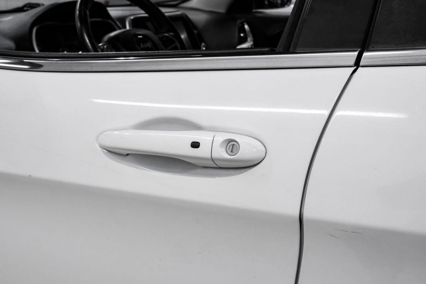 2015 Bright White Clearcoat /Indigo Blue/Brown Jeep Cherokee Limited (1C4PJMDS3FW) with an 3.2L V6 engine, Automatic transmission, located at 15300 Midway Rd., Addison, TX, 75001, (972) 702-0011, 32.958321, -96.838074 - Photo#43