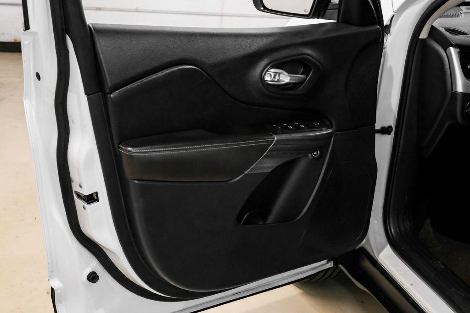 2015 Bright White Clearcoat /Indigo Blue/Brown Jeep Cherokee Limited (1C4PJMDS3FW) with an 3.2L V6 engine, Automatic transmission, located at 15300 Midway Rd., Addison, TX, 75001, (972) 702-0011, 32.958321, -96.838074 - Photo#44