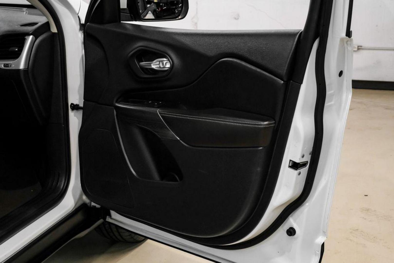 2015 Bright White Clearcoat /Indigo Blue/Brown Jeep Cherokee Limited (1C4PJMDS3FW) with an 3.2L V6 engine, Automatic transmission, located at 15300 Midway Rd., Addison, TX, 75001, (972) 702-0011, 32.958321, -96.838074 - Photo#46