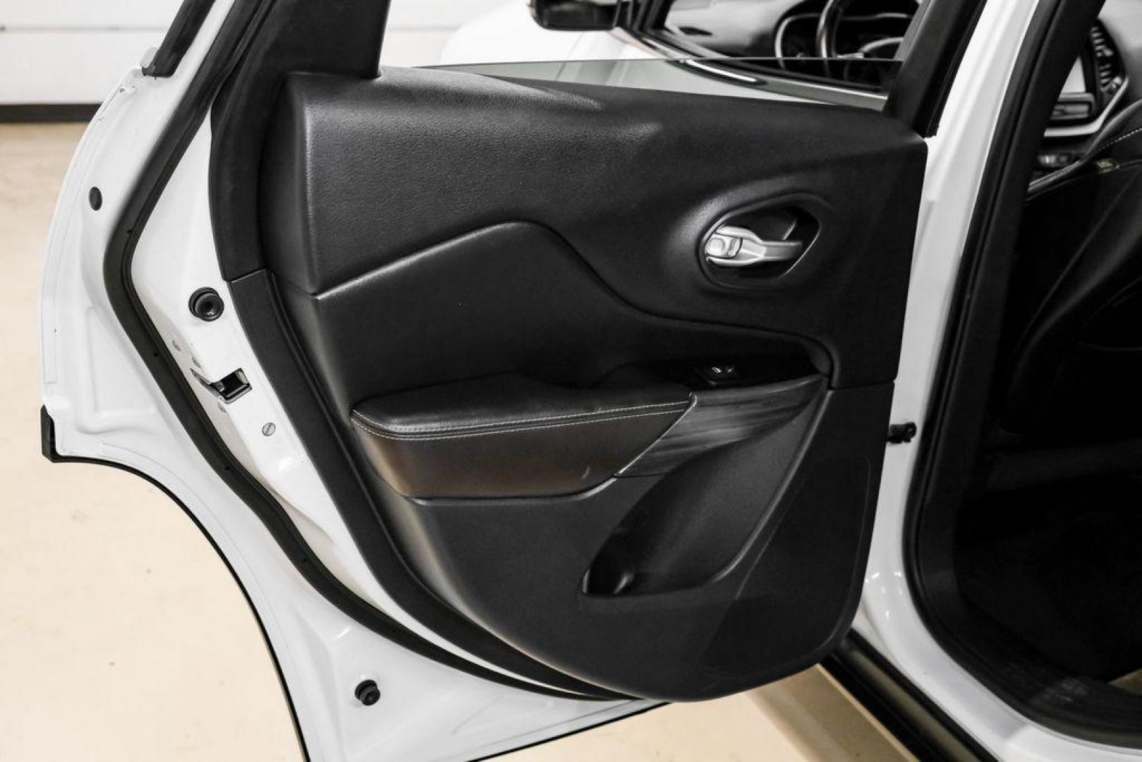 2015 Bright White Clearcoat /Indigo Blue/Brown Jeep Cherokee Limited (1C4PJMDS3FW) with an 3.2L V6 engine, Automatic transmission, located at 15300 Midway Rd., Addison, TX, 75001, (972) 702-0011, 32.958321, -96.838074 - Photo#47