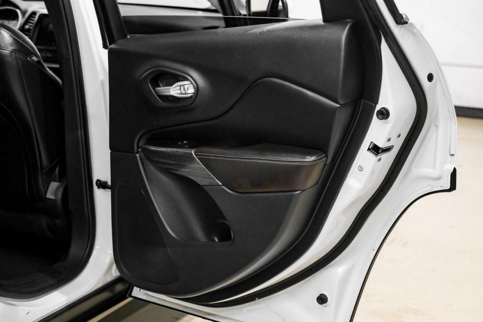 2015 Bright White Clearcoat /Indigo Blue/Brown Jeep Cherokee Limited (1C4PJMDS3FW) with an 3.2L V6 engine, Automatic transmission, located at 15300 Midway Rd., Addison, TX, 75001, (972) 702-0011, 32.958321, -96.838074 - Photo#48