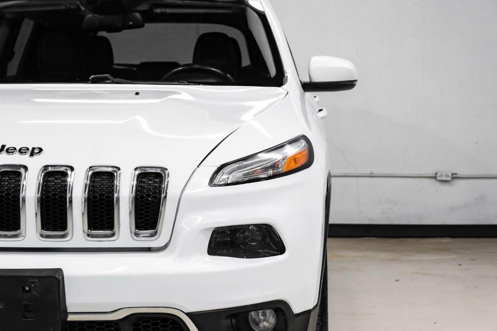 2015 Bright White Clearcoat /Indigo Blue/Brown Jeep Cherokee Limited (1C4PJMDS3FW) with an 3.2L V6 engine, Automatic transmission, located at 15300 Midway Rd., Addison, TX, 75001, (972) 702-0011, 32.958321, -96.838074 - Photo#49