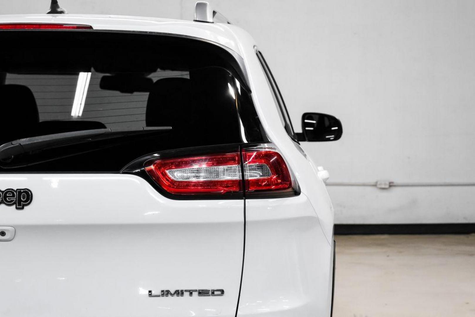 2015 Bright White Clearcoat /Indigo Blue/Brown Jeep Cherokee Limited (1C4PJMDS3FW) with an 3.2L V6 engine, Automatic transmission, located at 15300 Midway Rd., Addison, TX, 75001, (972) 702-0011, 32.958321, -96.838074 - Photo#50