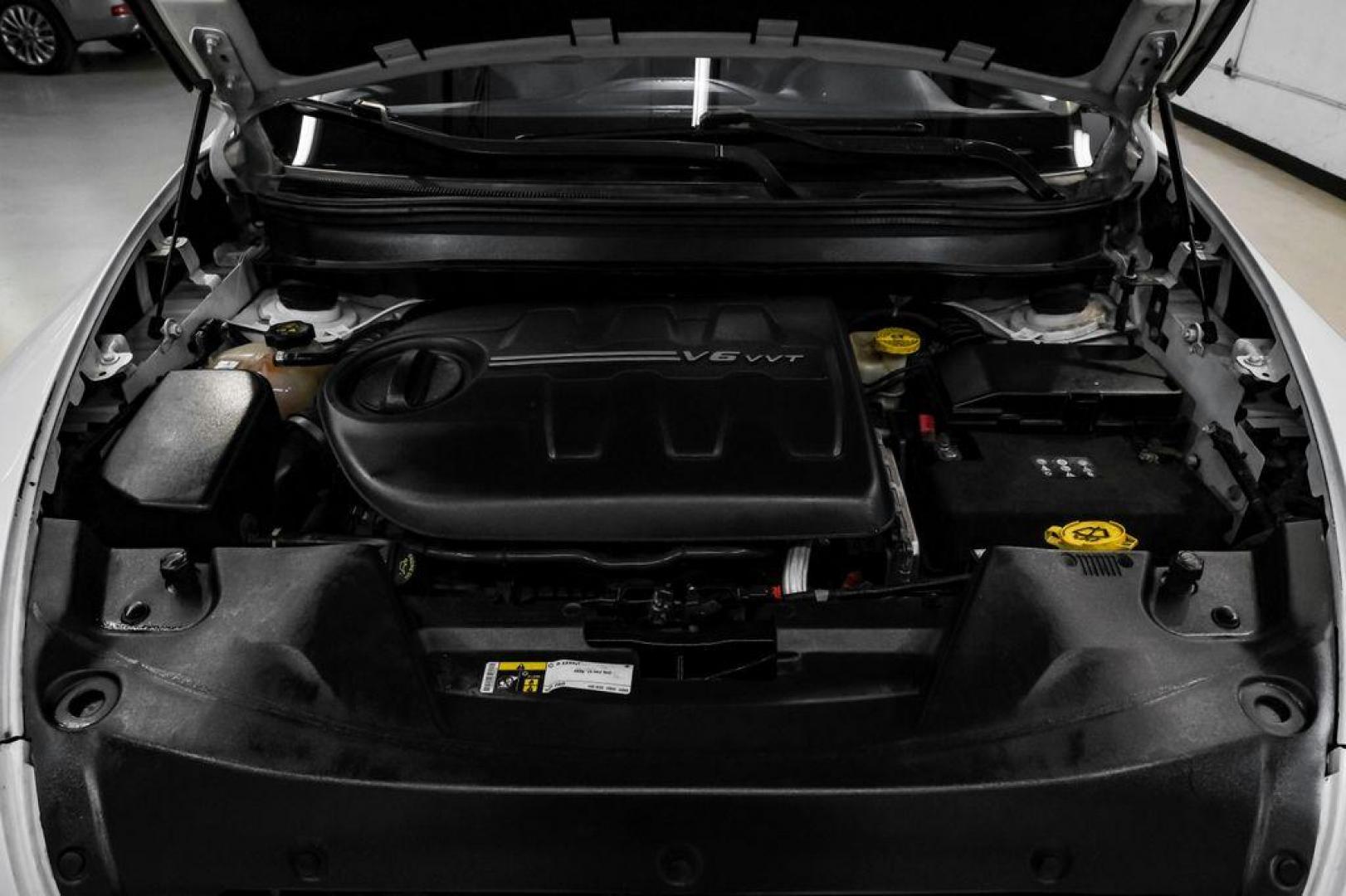 2015 Bright White Clearcoat /Indigo Blue/Brown Jeep Cherokee Limited (1C4PJMDS3FW) with an 3.2L V6 engine, Automatic transmission, located at 15300 Midway Rd., Addison, TX, 75001, (972) 702-0011, 32.958321, -96.838074 - Photo#52