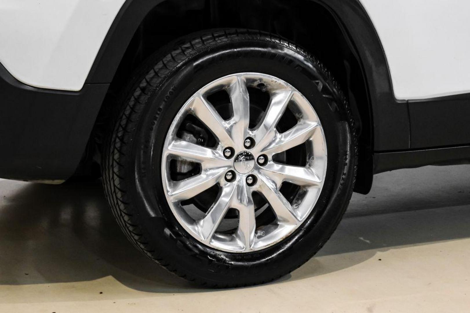 2015 Bright White Clearcoat /Indigo Blue/Brown Jeep Cherokee Limited (1C4PJMDS3FW) with an 3.2L V6 engine, Automatic transmission, located at 15300 Midway Rd., Addison, TX, 75001, (972) 702-0011, 32.958321, -96.838074 - Photo#56