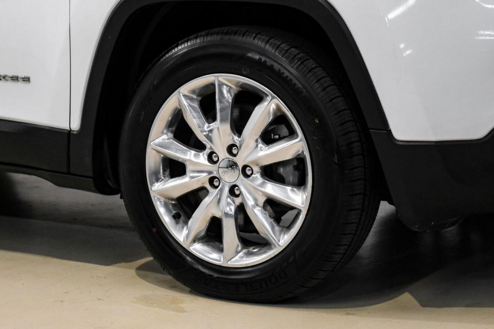 2015 Bright White Clearcoat /Indigo Blue/Brown Jeep Cherokee Limited (1C4PJMDS3FW) with an 3.2L V6 engine, Automatic transmission, located at 15300 Midway Rd., Addison, TX, 75001, (972) 702-0011, 32.958321, -96.838074 - Photo#57