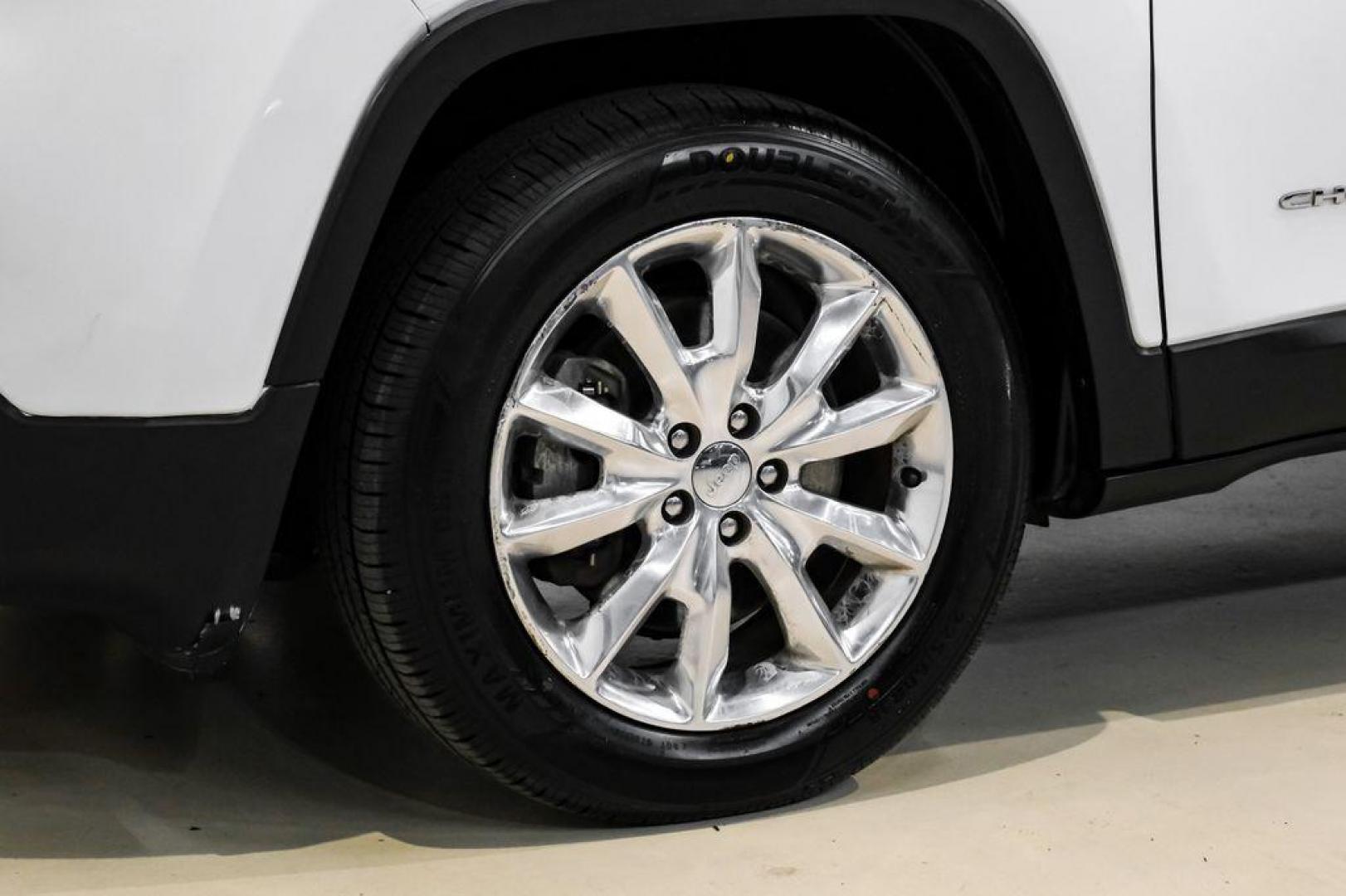 2015 Bright White Clearcoat /Indigo Blue/Brown Jeep Cherokee Limited (1C4PJMDS3FW) with an 3.2L V6 engine, Automatic transmission, located at 15300 Midway Rd., Addison, TX, 75001, (972) 702-0011, 32.958321, -96.838074 - Photo#58