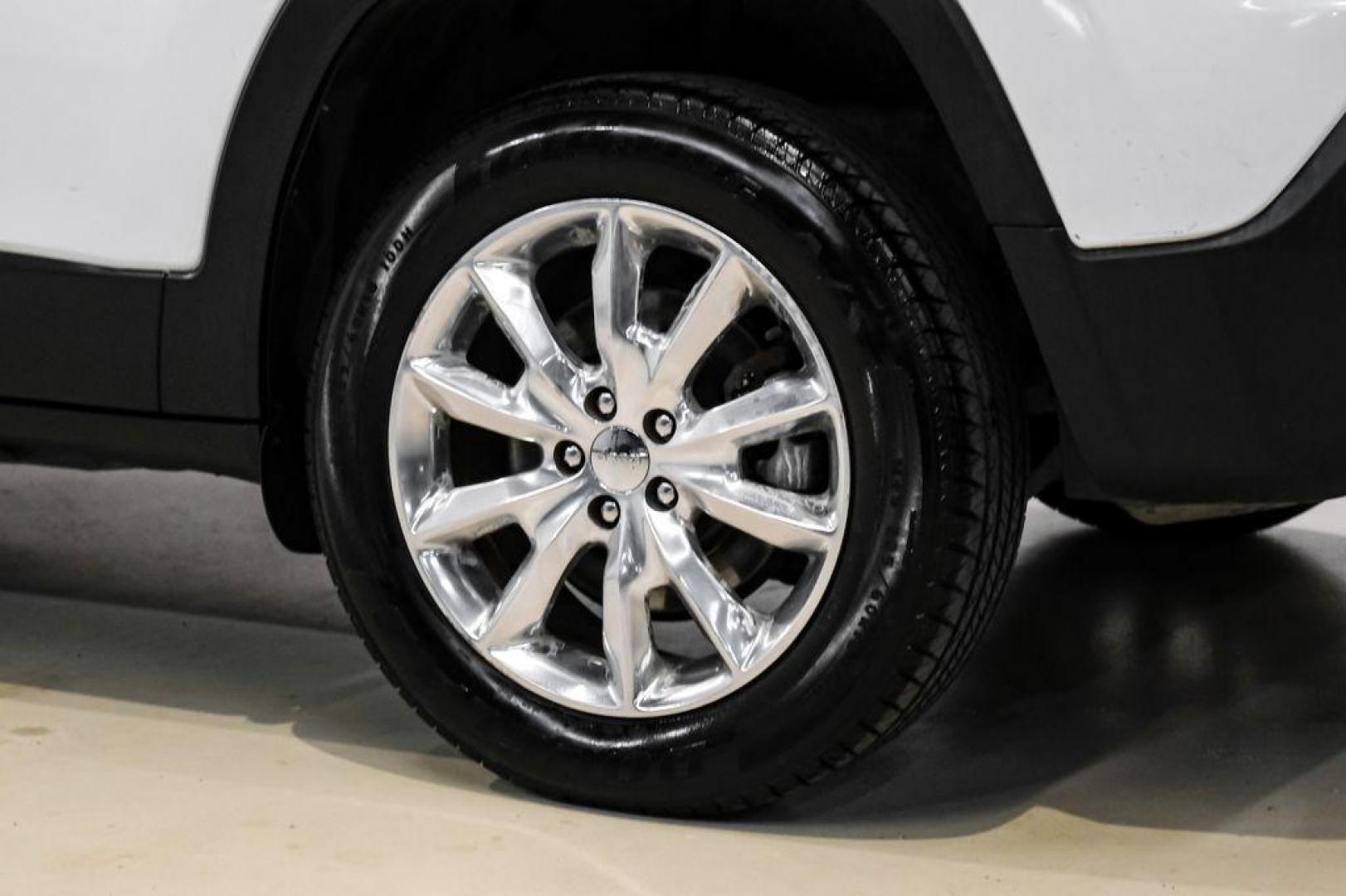 2015 Bright White Clearcoat /Indigo Blue/Brown Jeep Cherokee Limited (1C4PJMDS3FW) with an 3.2L V6 engine, Automatic transmission, located at 15300 Midway Rd., Addison, TX, 75001, (972) 702-0011, 32.958321, -96.838074 - Photo#59