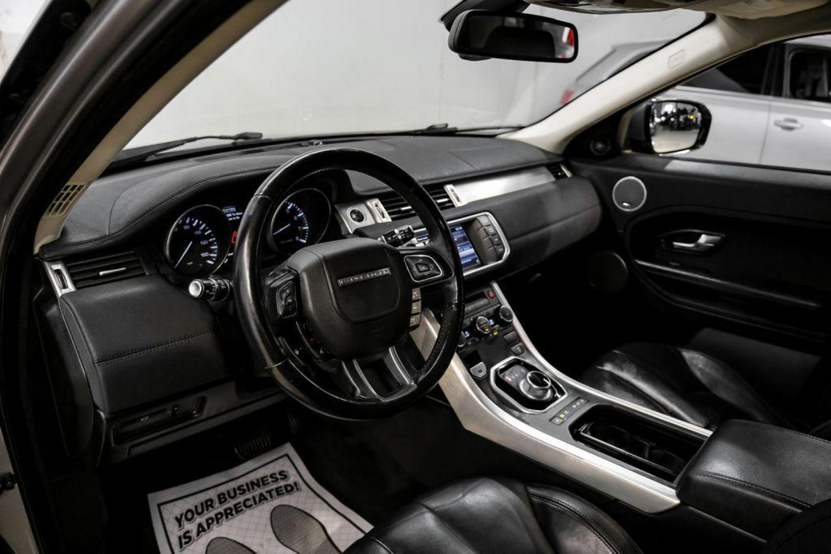 2013 Orkney Gray /Ebony/Ebony Land Rover Range Rover Evoque Pure (SALVR2BG8DH) with an 2.0L I4 engine, Automatic transmission, located at 15300 Midway Rd., Addison, TX, 75001, (972) 702-0011, 32.958321, -96.838074 - Photo#2