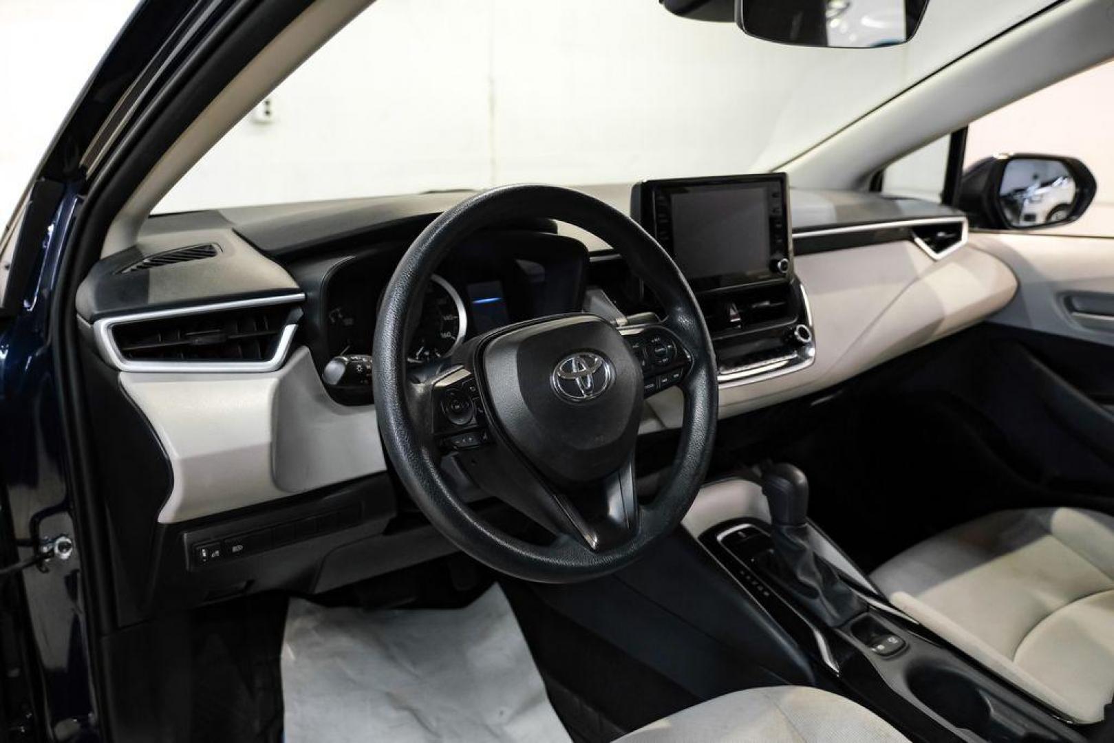 2022 Blueprint /Black/Blue Toyota Corolla LE (5YFEPMAE7NP) with an 1.8L I4 DOHC 16V engine, CVT transmission, located at 15300 Midway Rd., Addison, TX, 75001, (972) 702-0011, 32.958321, -96.838074 - Photo#2