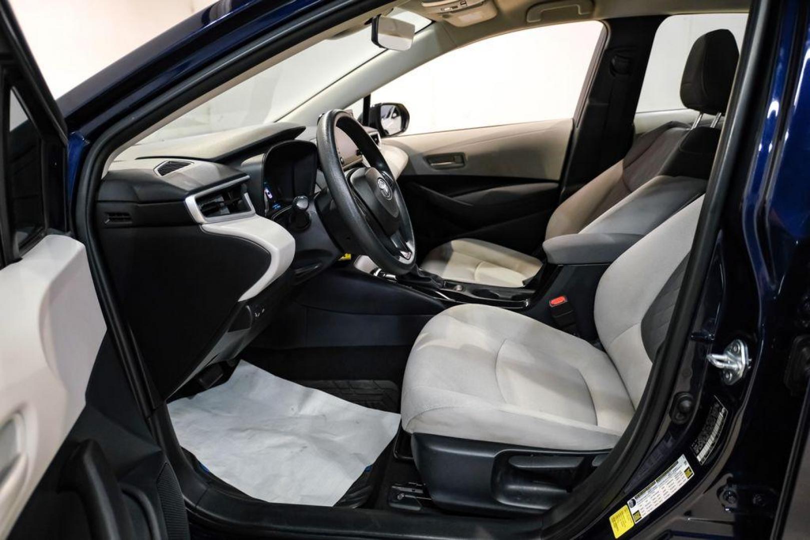 2022 Blueprint /Black/Blue Toyota Corolla LE (5YFEPMAE7NP) with an 1.8L I4 DOHC 16V engine, CVT transmission, located at 15300 Midway Rd., Addison, TX, 75001, (972) 702-0011, 32.958321, -96.838074 - Photo#3