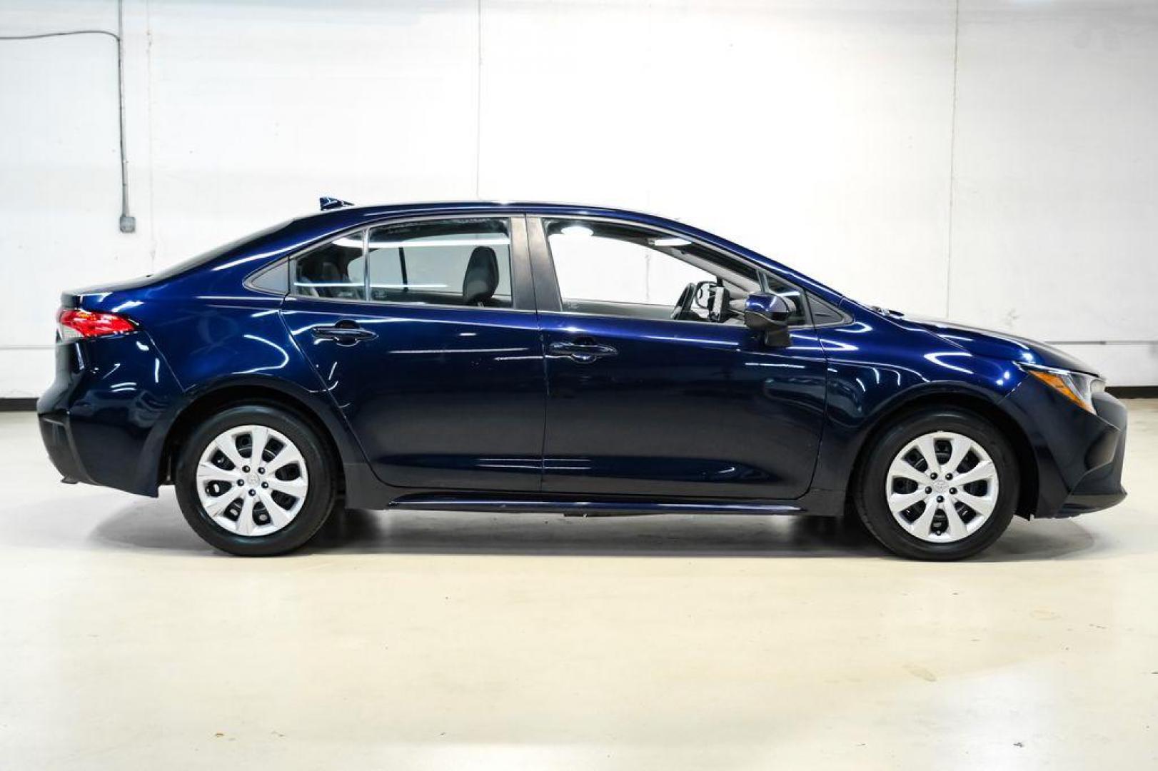 2022 Blueprint /Black/Blue Toyota Corolla LE (5YFEPMAE7NP) with an 1.8L I4 DOHC 16V engine, CVT transmission, located at 15300 Midway Rd., Addison, TX, 75001, (972) 702-0011, 32.958321, -96.838074 - Photo#6