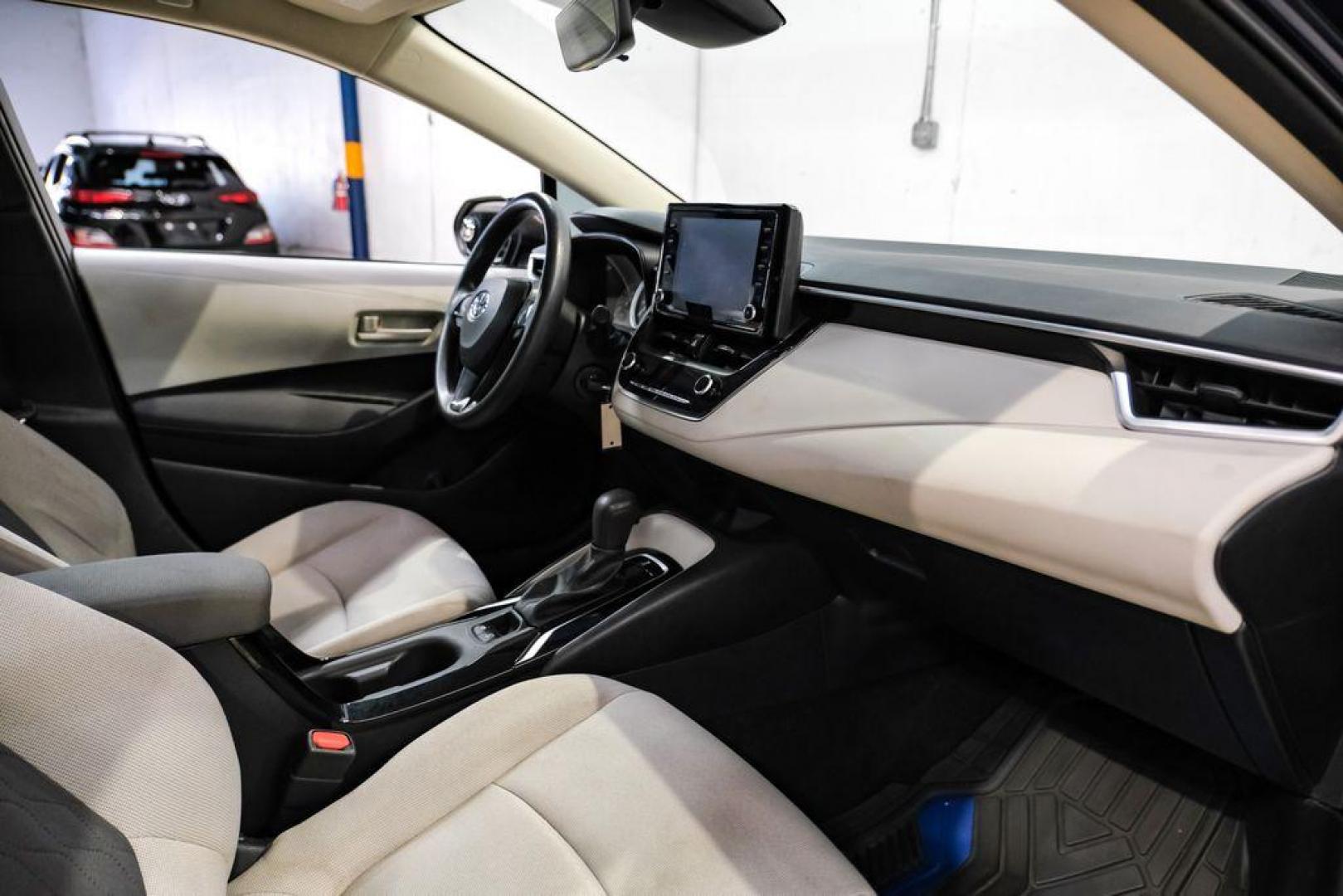 2022 Blueprint /Black/Blue Toyota Corolla LE (5YFEPMAE7NP) with an 1.8L I4 DOHC 16V engine, CVT transmission, located at 15300 Midway Rd., Addison, TX, 75001, (972) 702-0011, 32.958321, -96.838074 - Photo#11